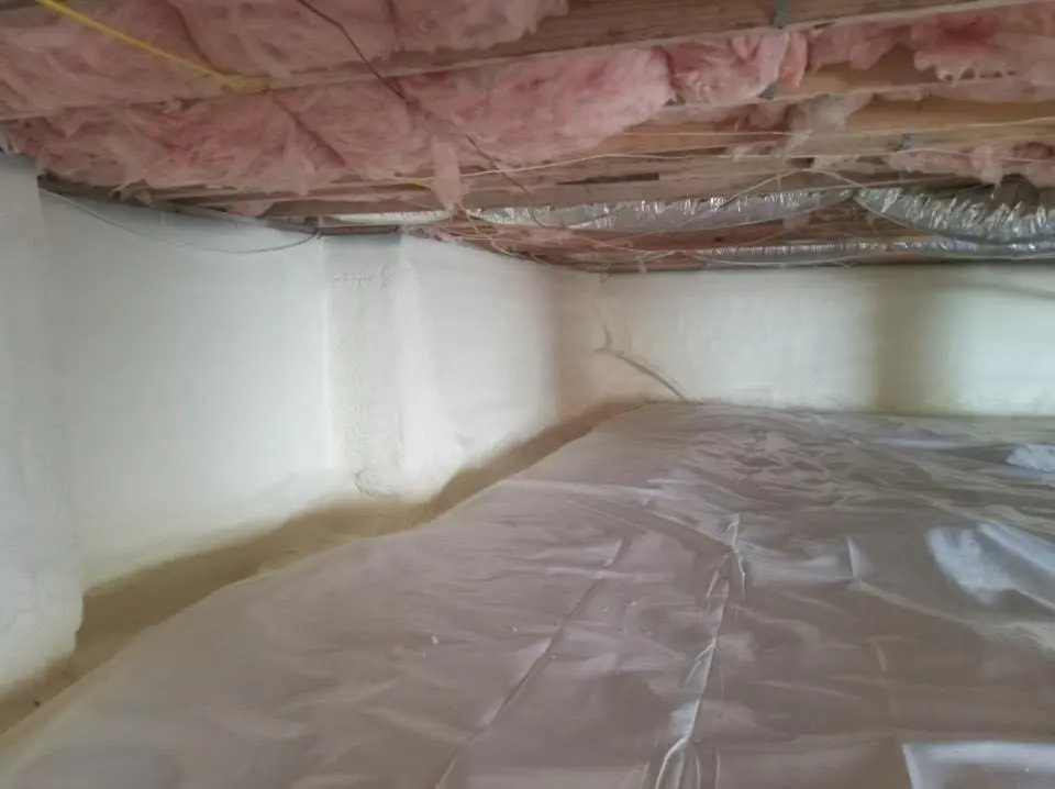 Crawl space encapsulation with closed-cell spray foam for Commercial Roof Restoration in Salem
